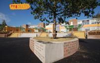 Red brick and ochre laminate panels give a warm feel to the school’s exterior