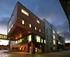 At the rear of the new complex, two upper floors crash out above a pedestrian alley.