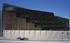 Four curvaceous car ramps burst out of the louvred east facade of Grosvenor's multistorey car park in Liverpool.