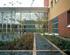 The West Middlesex University Hospital, London by architect Nightingale Associates features blocks arranged around attractive courtyards. These contain the outpatients department at ground floor level with wards above