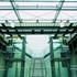 Scenic glass lifts flank the grand stairs at Manchester Art Gallery