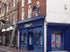 Man above betting shop