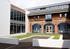 The quadrangle at the heart of the school is  made by adding a white-rendered extension to a red-brick nineties wing
