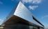 The Foster + Partners designed hospital for Circle Healthcare is clad in bespoke aluminium shingles made by Gilmour combined with an off the shelf glazing system by Schuco. It was installed by Lakesmere