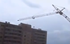 A crane crashes into a Russian housing development
