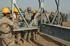 American soldiers teaching bridge building in Iraq