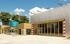 The exterior of the arts centre might look confusing but is intended to inspire creativity. The main performance space is on the other side of the glazed wall – this can be opened up so the carnival can spill out into the courtyard